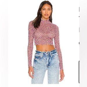 This is a For Love & Lemons Nadia Sheer Cropped Turtleneck